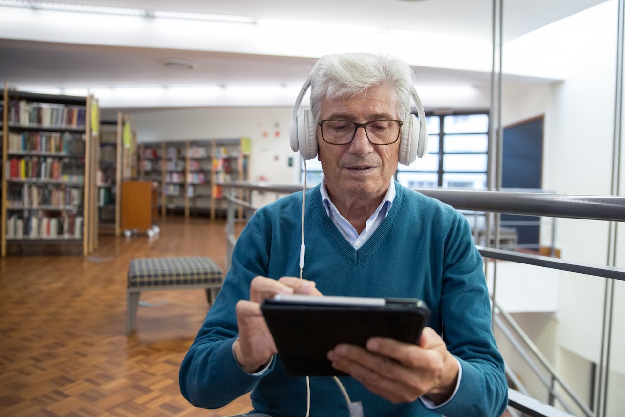man listening to audio book